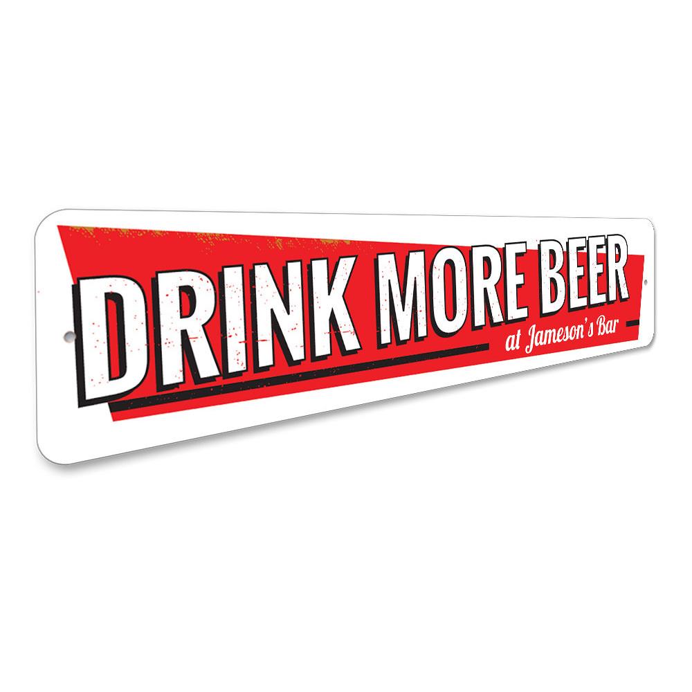 A decorative Drink More Beer Sign made of aluminum, featuring humorous text and a stylish design, perfect for home decor.