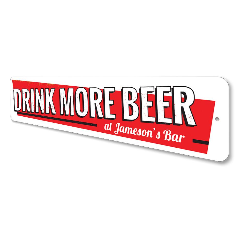 A decorative Drink More Beer Sign made of aluminum, featuring humorous text and a stylish design, perfect for home decor.