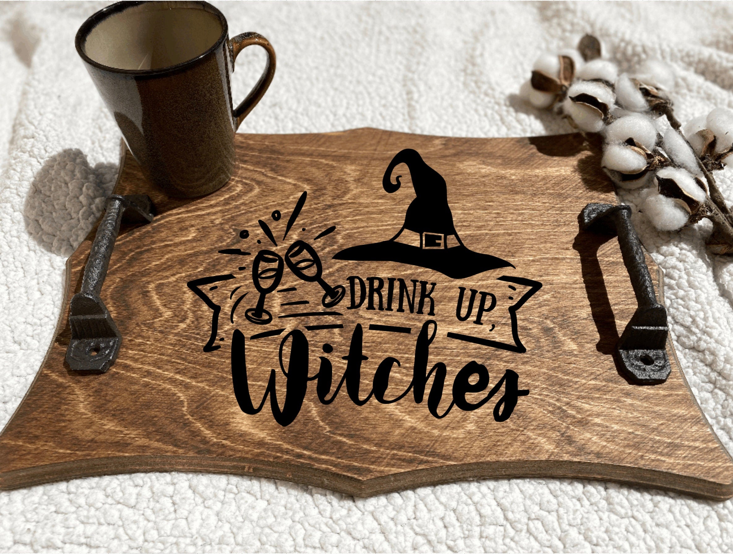 Handmade wooden serving tray with a spooky design, featuring cast iron handles and a rich chestnut stain, perfect for witches and Halloween gatherings.