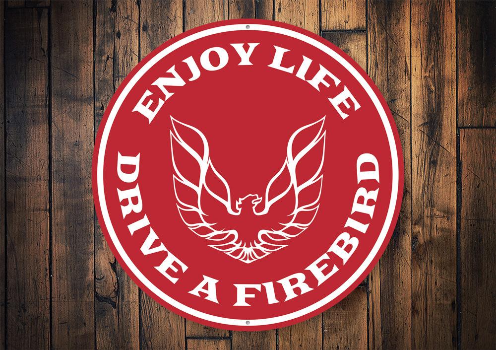 Drive a Firebird Car Sign made from high-quality aluminum, featuring vibrant colors and a classic design, perfect for garages and man caves.