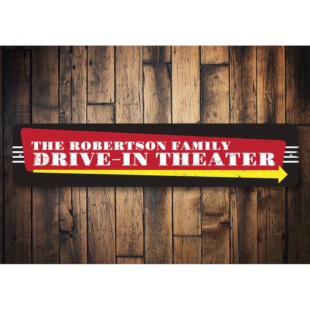 A vibrant Drive-In Theater Sign made of high-quality aluminum, featuring retro design elements perfect for home decor.