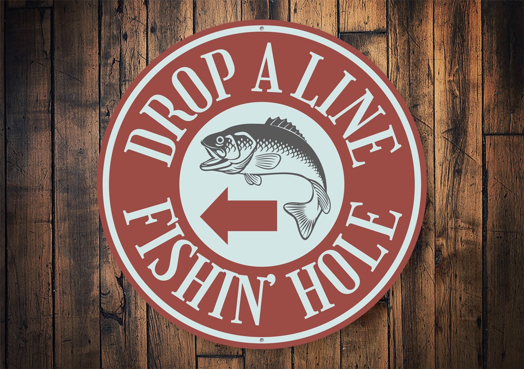 Drop A Line Fishin' Hole Sign made of aluminum, featuring a fishing theme, perfect for lakehouse decor.