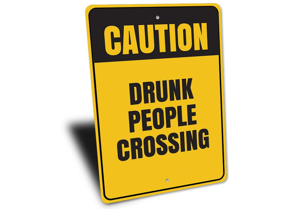 A humorous Drunk People Crossing Sign made of aluminum, featuring a playful design perfect for man caves and home decor.