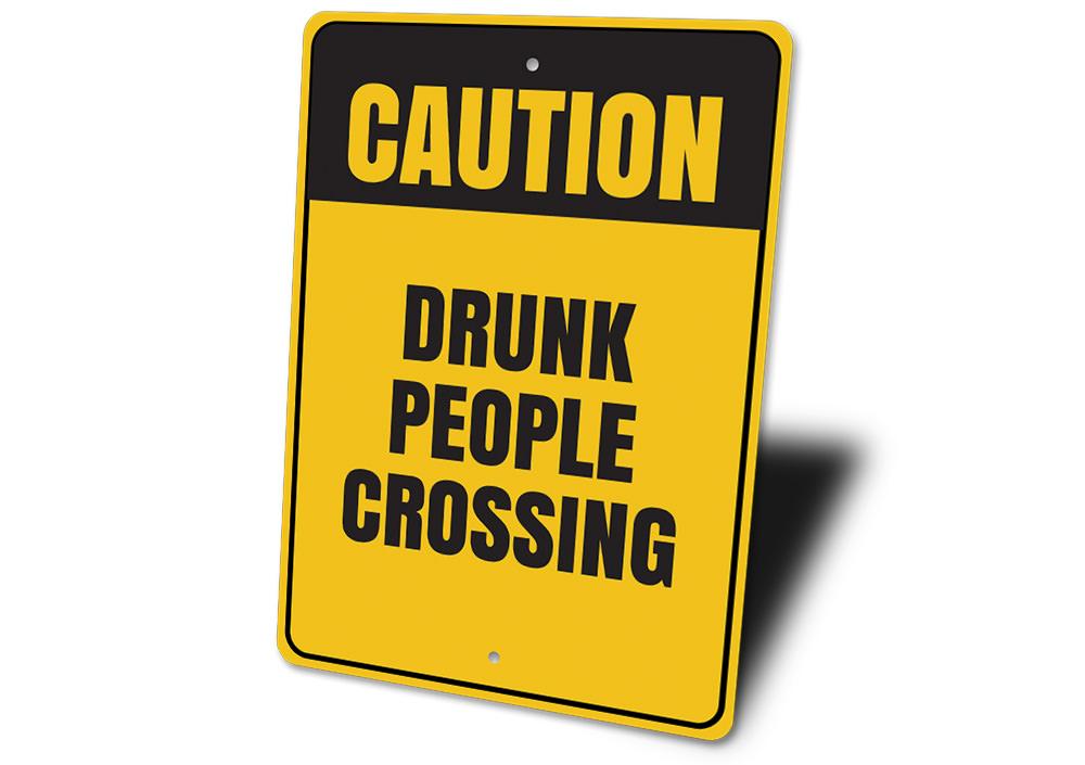 A humorous Drunk People Crossing Sign made of aluminum, featuring a playful design perfect for man caves and home decor.