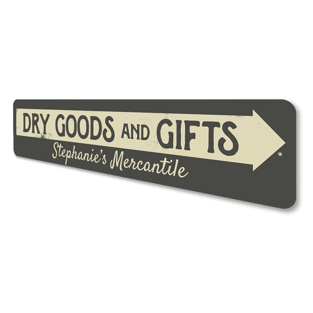 Decorative Dry Goods & Gifts Arrow Sign made of aluminum, featuring a stylish design suitable for businesses and personal gifts.