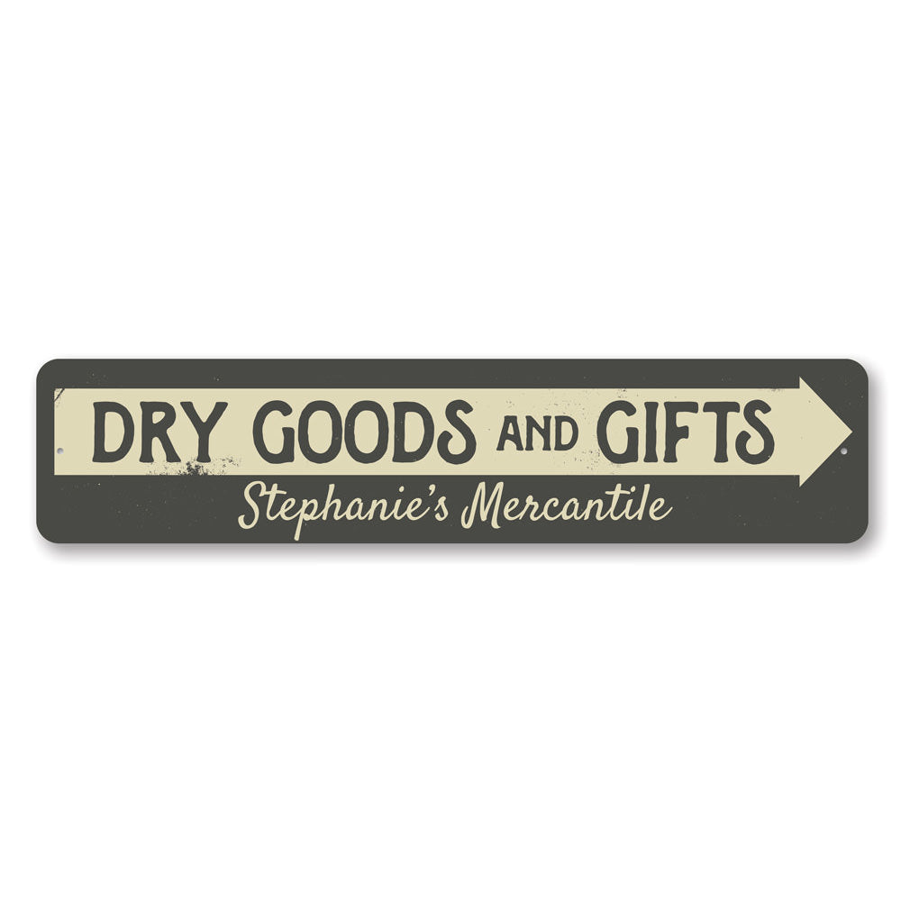 Decorative Dry Goods & Gifts Arrow Sign made of aluminum, featuring a stylish design suitable for businesses and personal gifts.