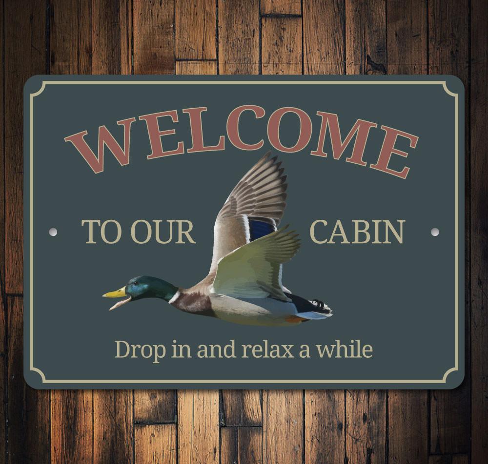 Duck Cabin Sign made from high-quality aluminum, featuring customizable text and pre-drilled holes for easy mounting.