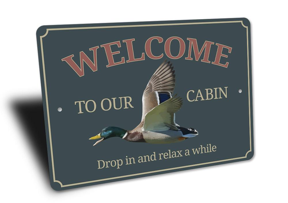 Duck Cabin Sign made from high-quality aluminum, featuring customizable text and pre-drilled holes for easy mounting.