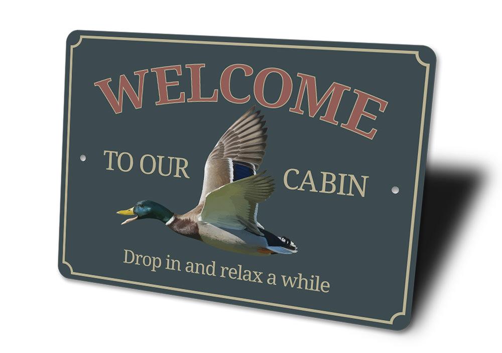 Duck Cabin Sign made from high-quality aluminum, featuring customizable text and pre-drilled holes for easy mounting.