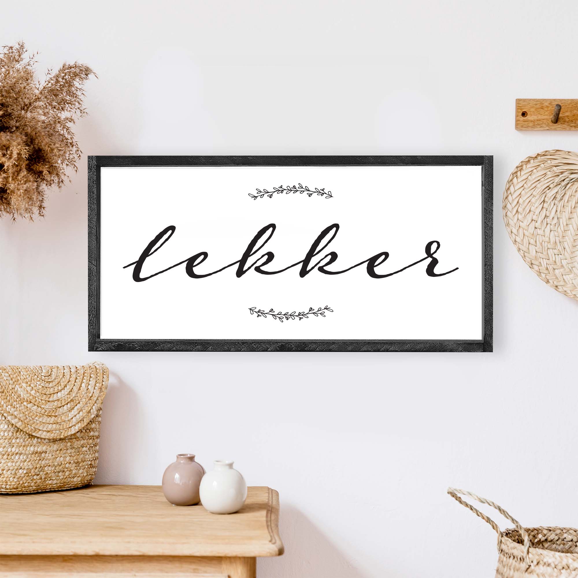 A beautifully crafted Dutch Lekker Wood Sign measuring 13x13 inches, featuring a stained pine wood frame and waterproof black text on a white background.