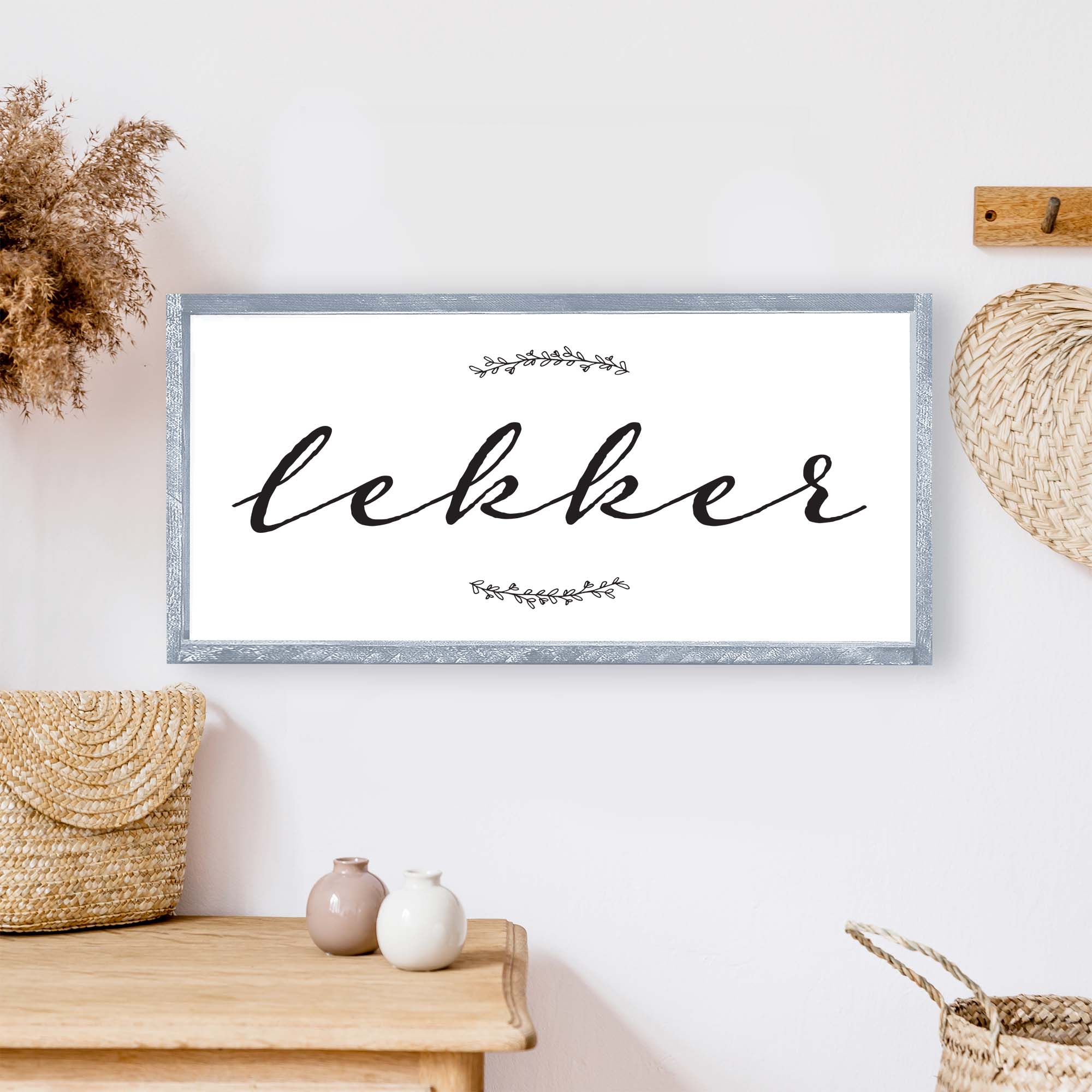 A beautifully crafted Dutch Lekker Wood Sign measuring 13x13 inches, featuring a stained pine wood frame and waterproof black text on a white background.