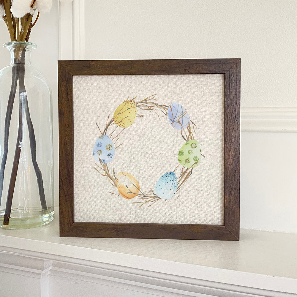 Easter Egg Wreath framed sign with colorful eggs and a wood frame, perfect for holiday decor.