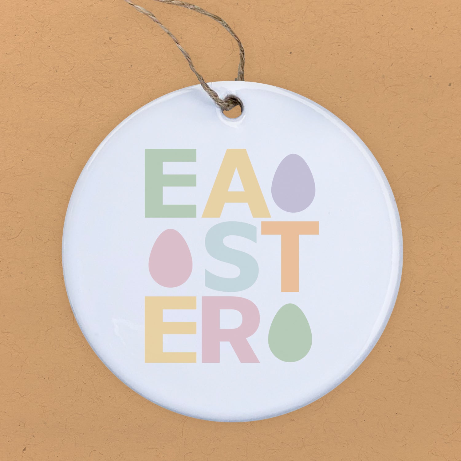 A beautifully crafted porcelain ornament featuring colorful Easter egg designs, perfect for seasonal decoration or gifting.