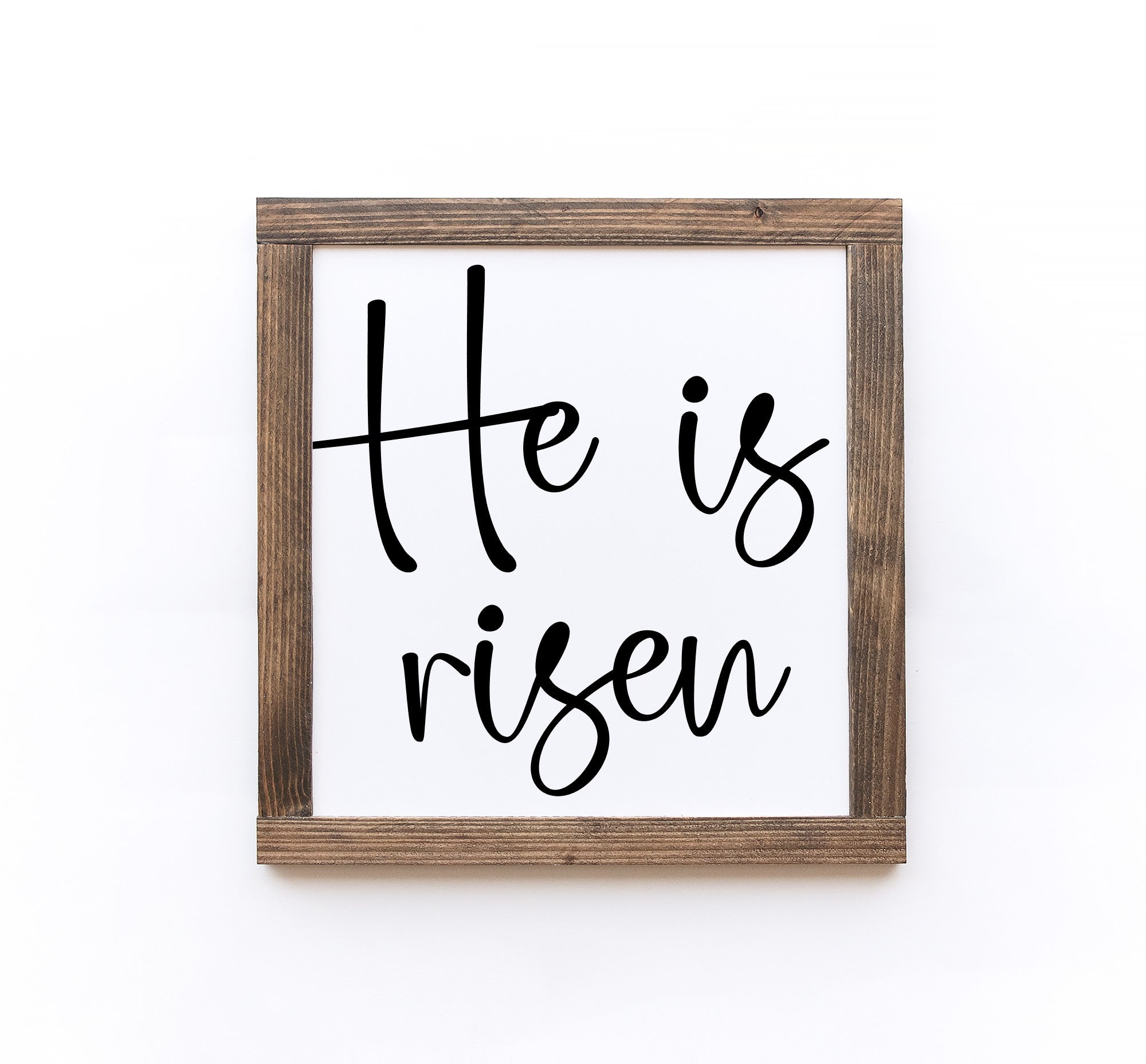 Handmade Easter wood signs in white with painted lettering, available in two sizes, showcasing unique wood grain and knots.