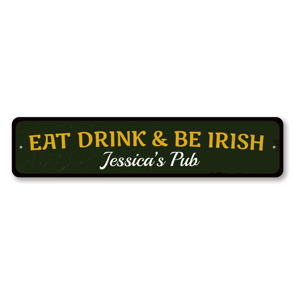 A decorative 'Eat Drink & Be Irish' metal sign, featuring vibrant colors and a charming design, perfect for home decor.