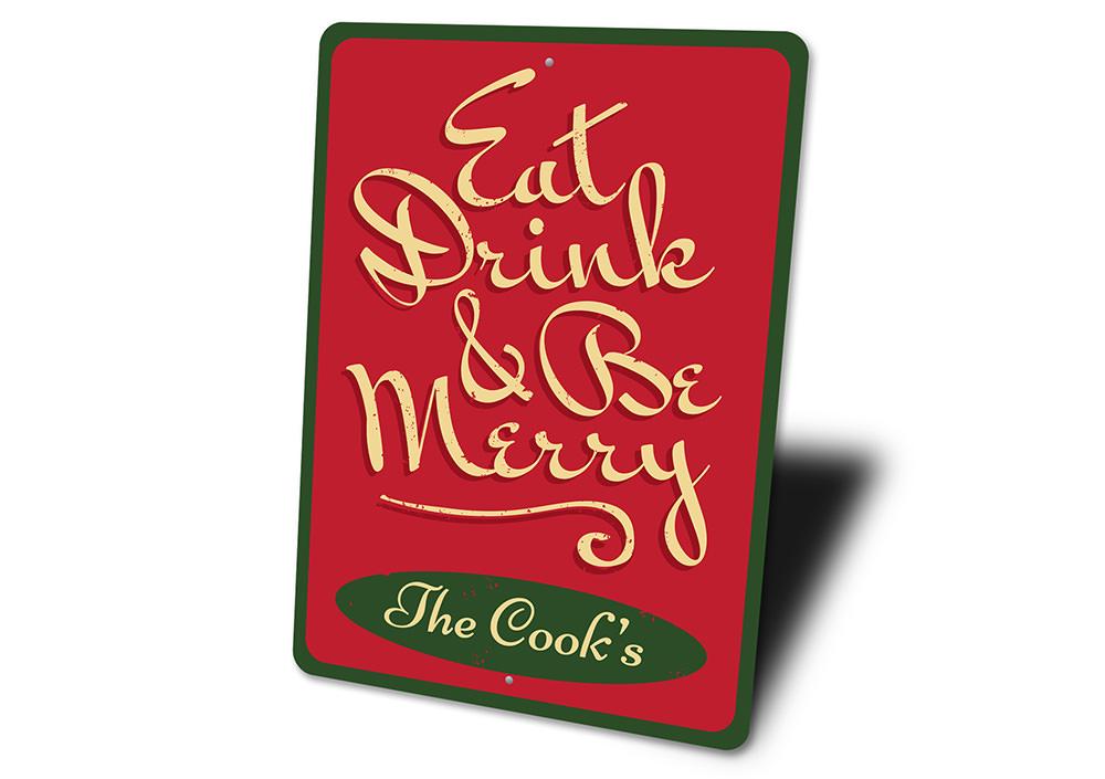 A festive Eat, Drink, & Be Merry Sign made of durable aluminum, featuring vibrant colors and a charming design, perfect for holiday decor.