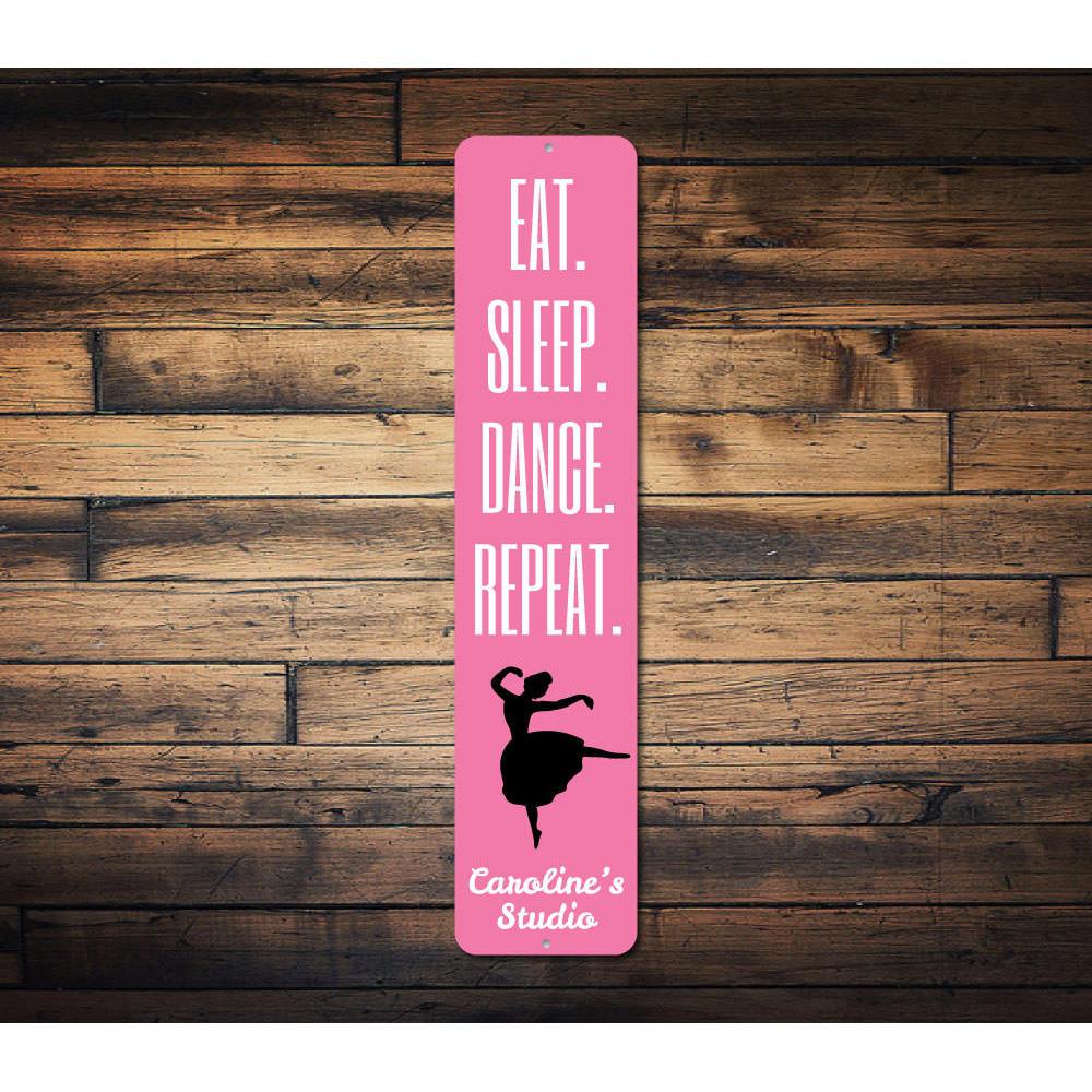 Colorful Eat Sleep Dance Repeat Sign made of durable aluminum, perfect for kids' rooms and dance enthusiasts.