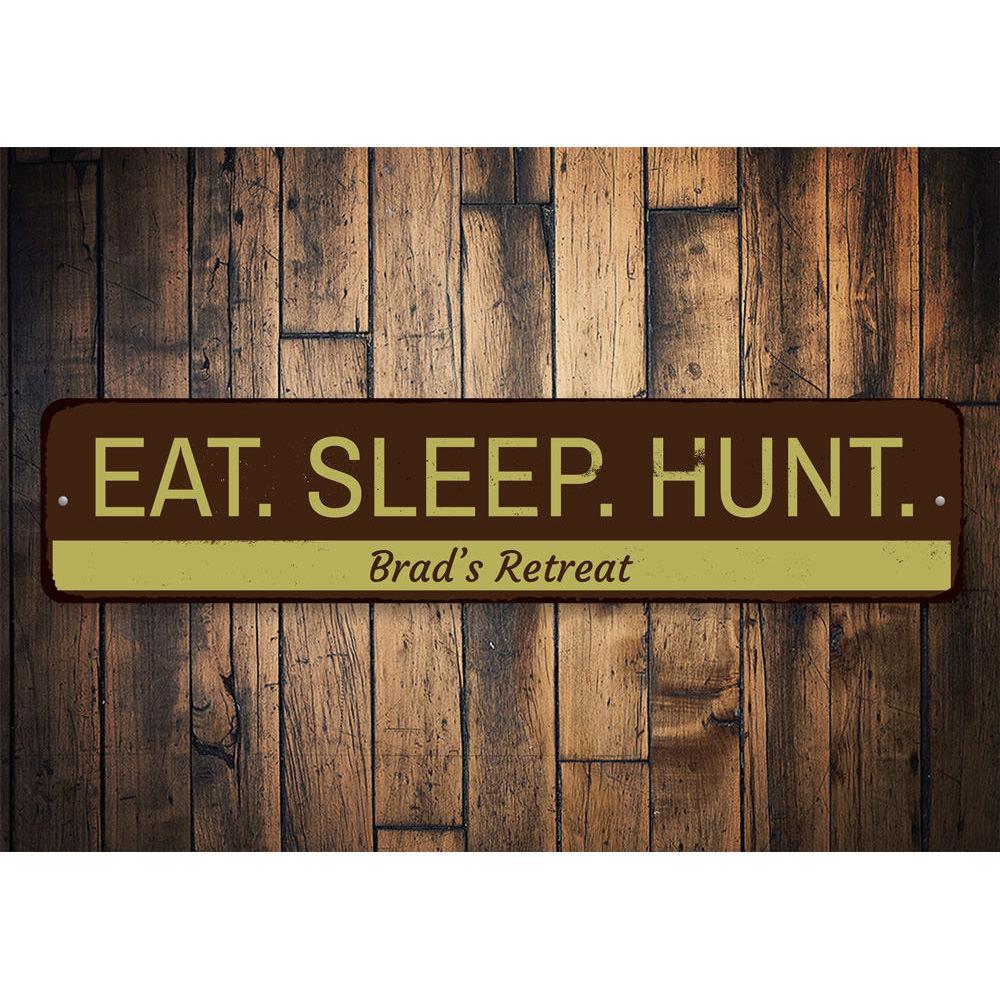 Eat Sleep Hunt Sign made of high-quality aluminum, featuring a rustic design perfect for hunters' decor.