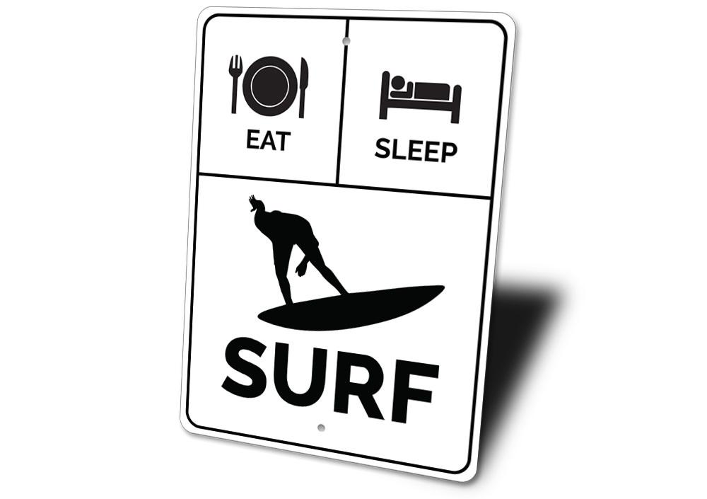 A decorative Eat Sleep Surf Sign made of high-quality aluminum, featuring vibrant colors and a beach-themed design, perfect for coastal decor.