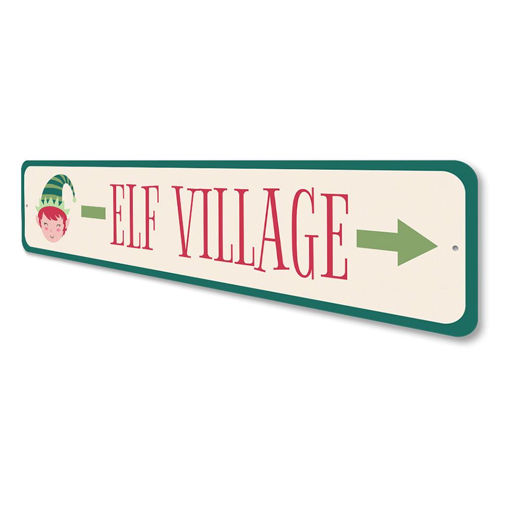 Elf Village This Way Holiday Sign made of aluminum, featuring festive design perfect for Christmas decorations.