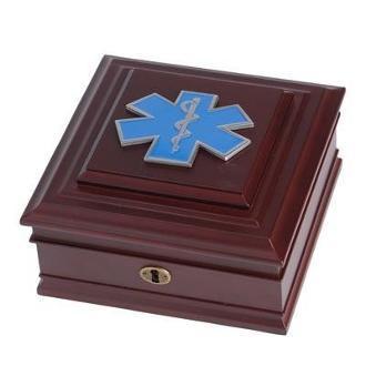 An elegant EMS Medallion Desktop Box made from mahogany wood, featuring a brass lock, key, and a felt-lined interior.