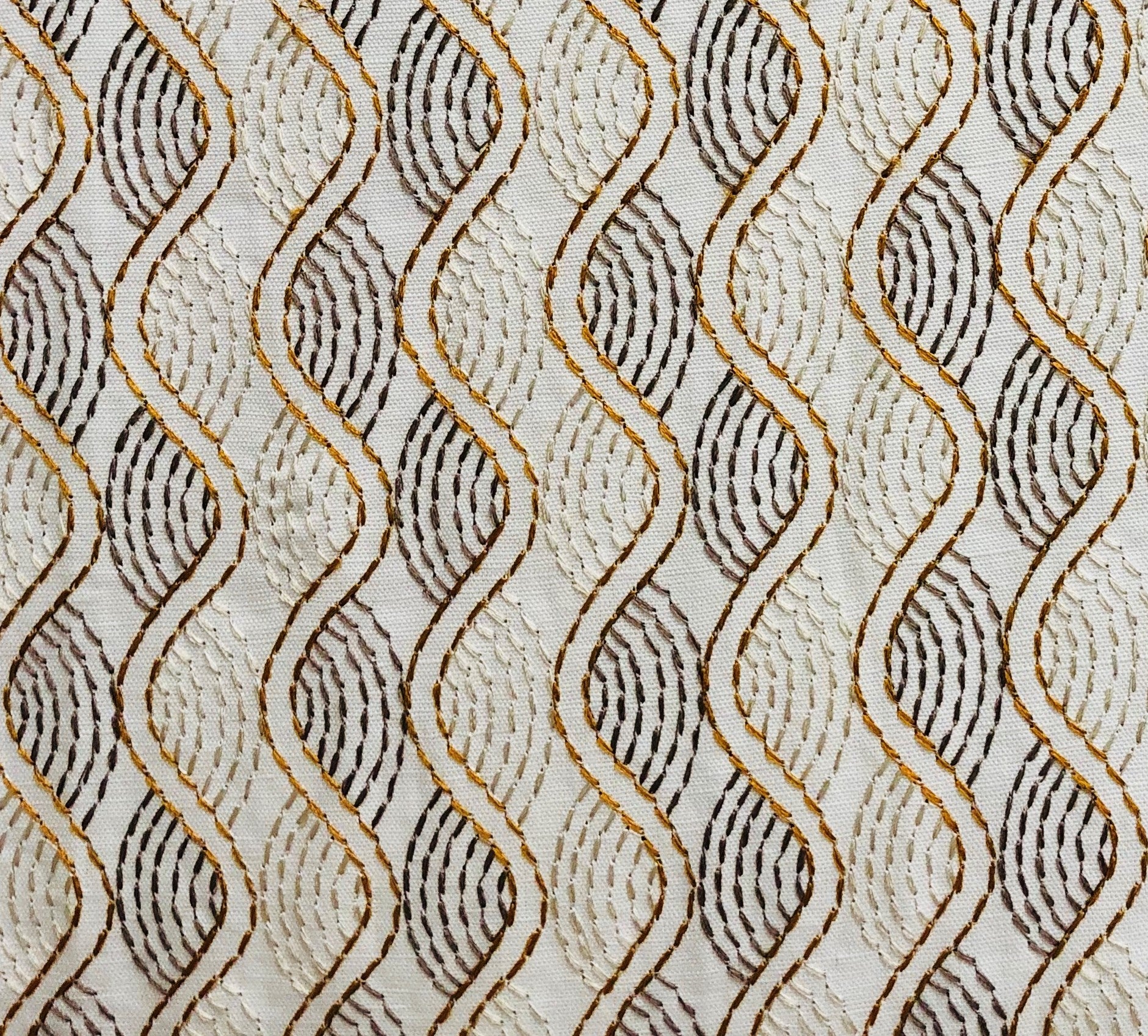 Enigma Twist Luxury Throw Pillow in beige and gold, showcasing a stylish design with a blend of cotton, linen, and viscose fabric.