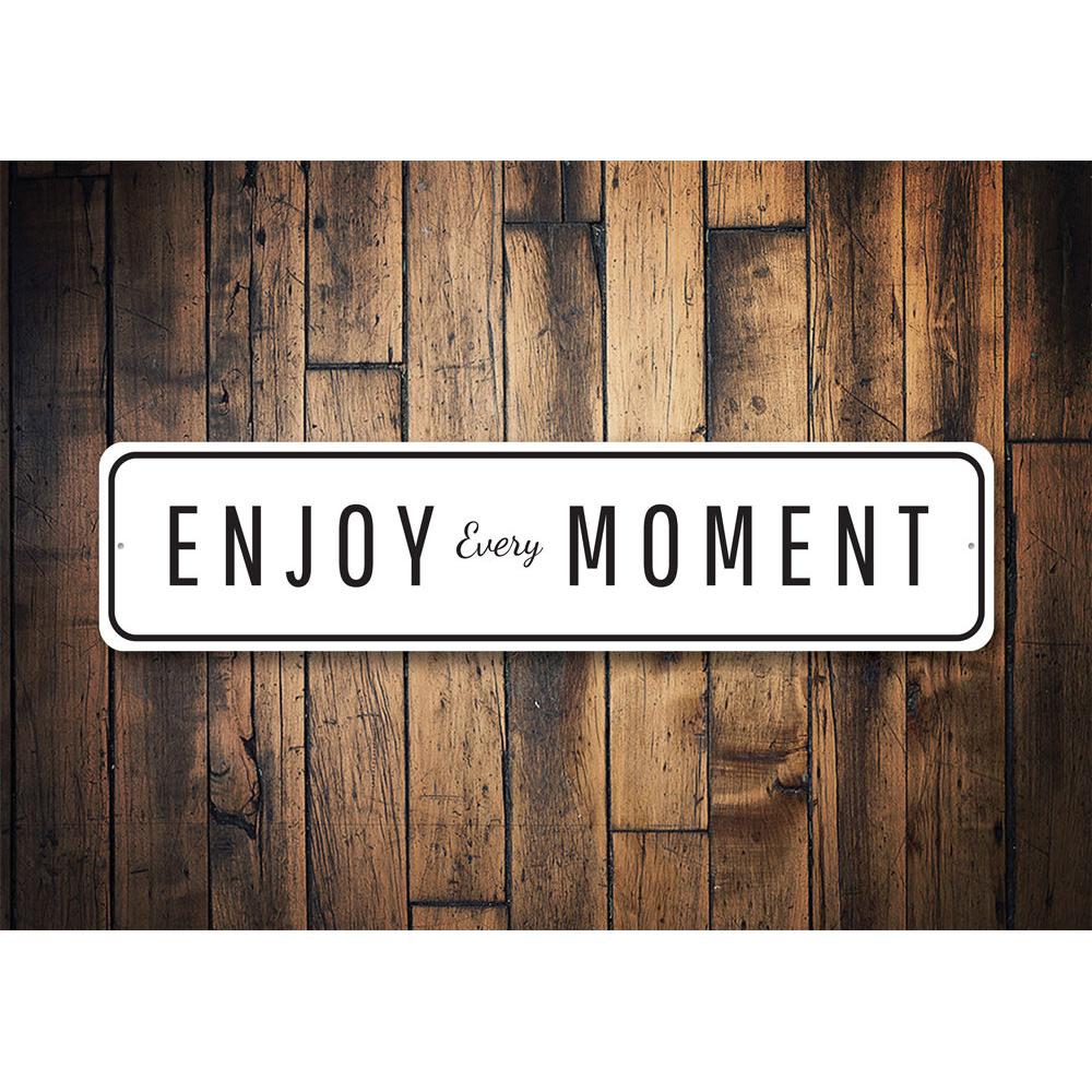 Enjoy Every Moment Sign made of high-quality aluminum, featuring customizable text and pre-drilled holes for easy mounting.