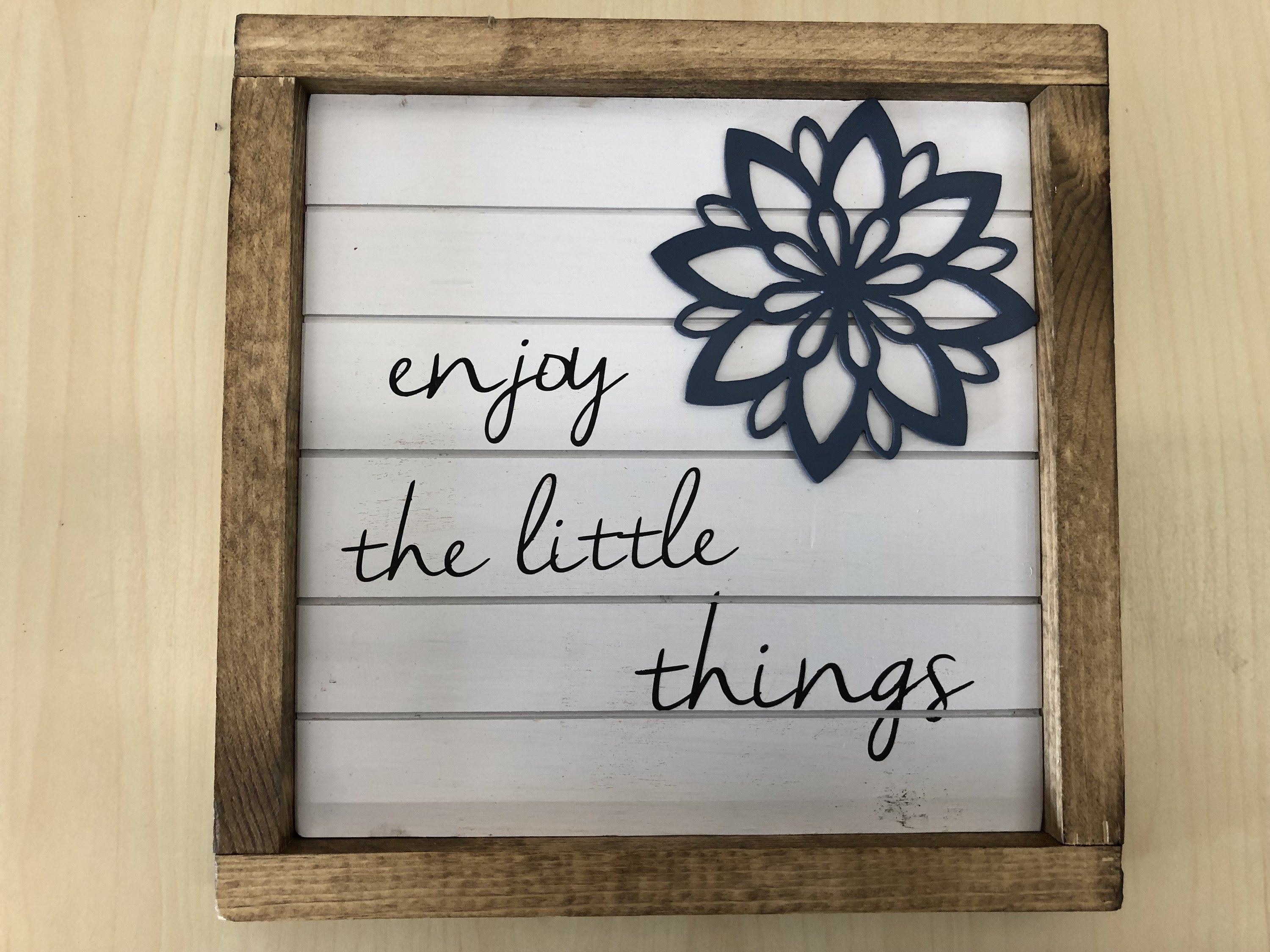 Enjoy The Little Things Wood Wall Art Frame featuring a steel lotus flower, elegantly designed for home decor.