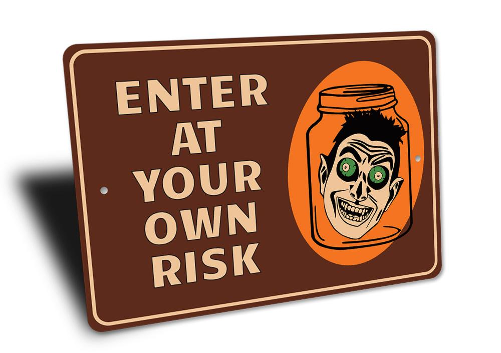 Enter at Your Own Risk Halloween Sign made of high-quality aluminum, featuring spooky design elements perfect for Halloween decor.