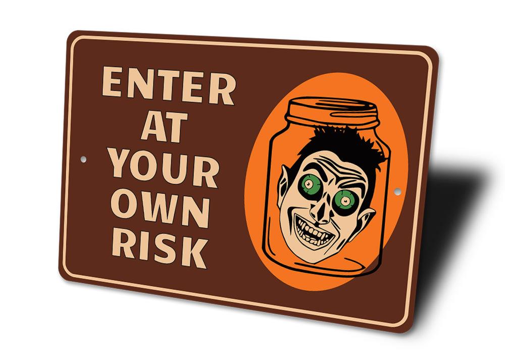 Enter at Your Own Risk Halloween Sign made of high-quality aluminum, featuring spooky design elements perfect for Halloween decor.