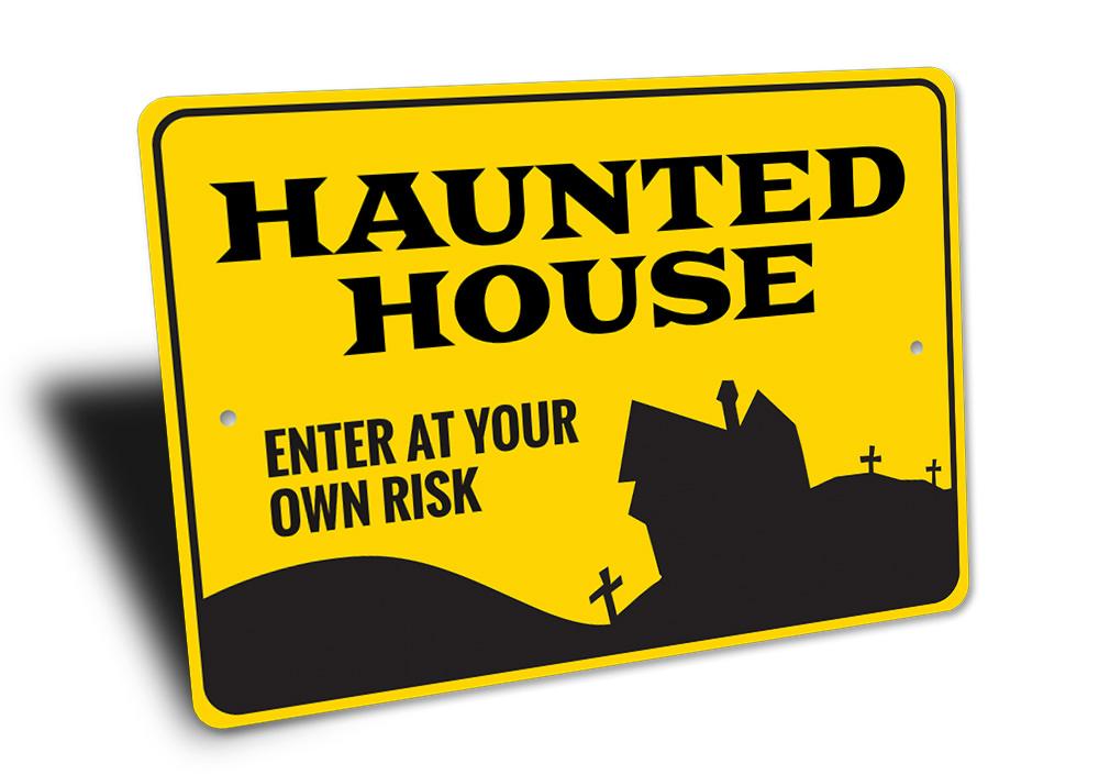 A spooky Enter Haunted House Sign made of durable aluminum, featuring eerie graphics perfect for Halloween decorations.