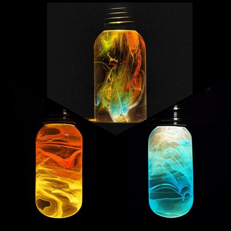 Three unique EP LIGHT LED bulbs showcasing handcrafted designs in vibrant colors.