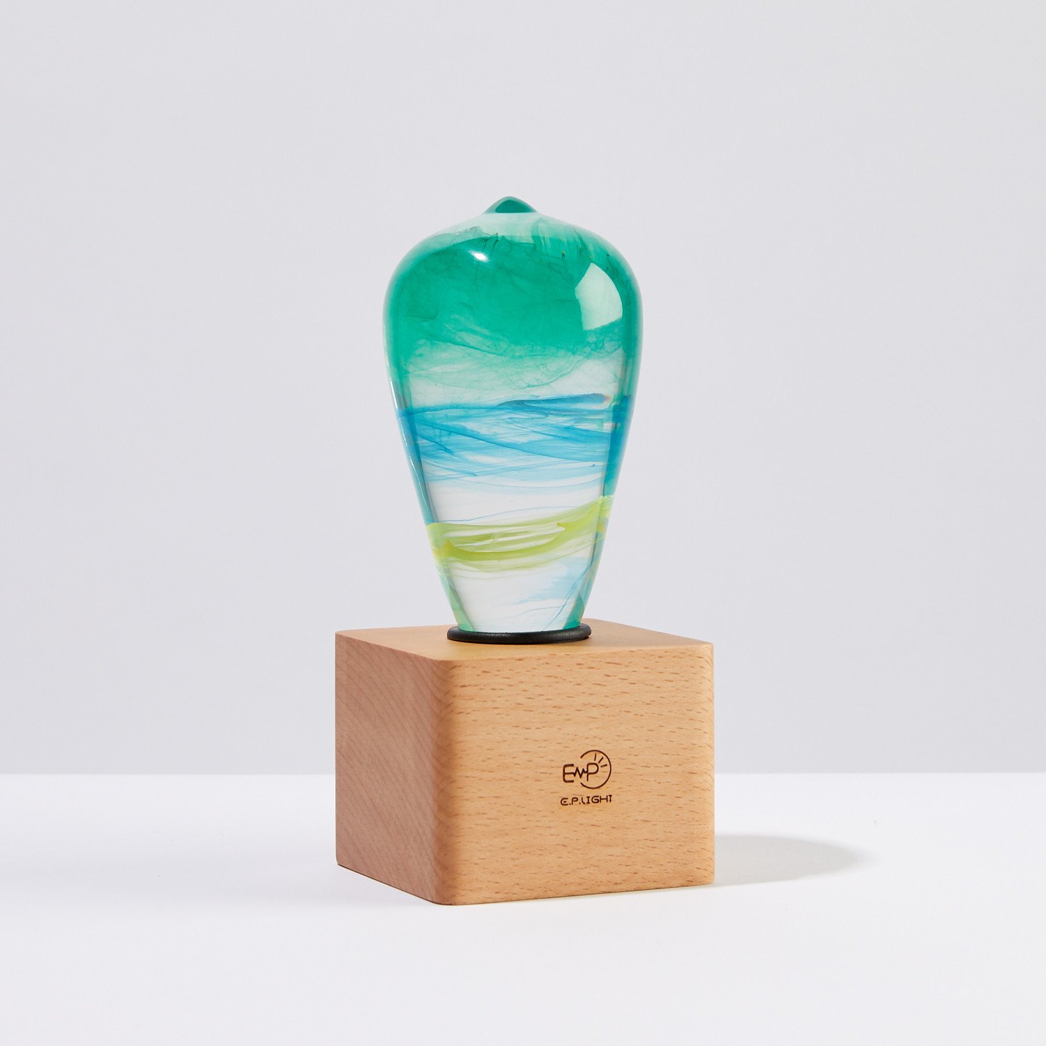 EP LIGHT - Alice LED bulb with eco-friendly resin construction and wooden base, showcasing its handcrafted design.