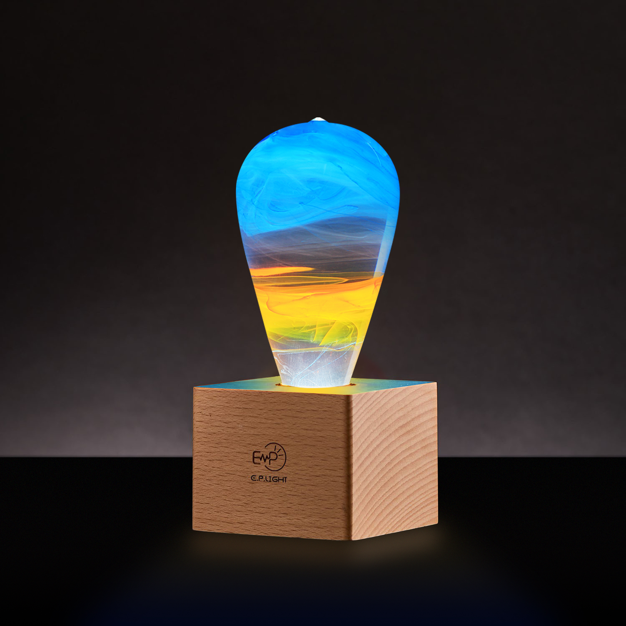 EP Light - Fire LED bulb with mixed colors and a handcrafted design, showcasing eco-friendly materials and a stylish beech wood base.