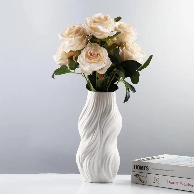 Ethereal Wave Vase in white ceramic with a unique wave design, showcasing its tall and elegant silhouette.