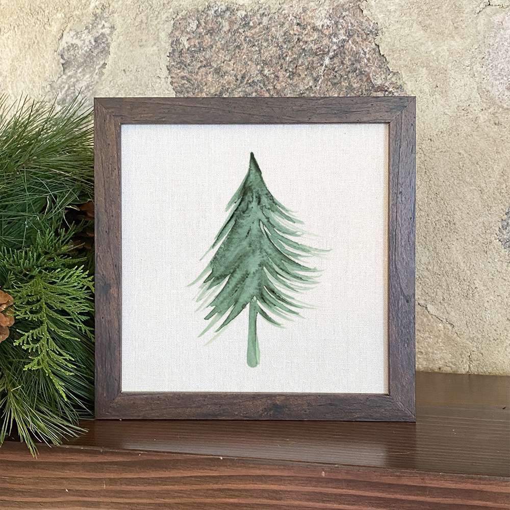 Evergreen Tree Framed Sign with a stylized wood frame and eco-friendly printing on a linen-look background.