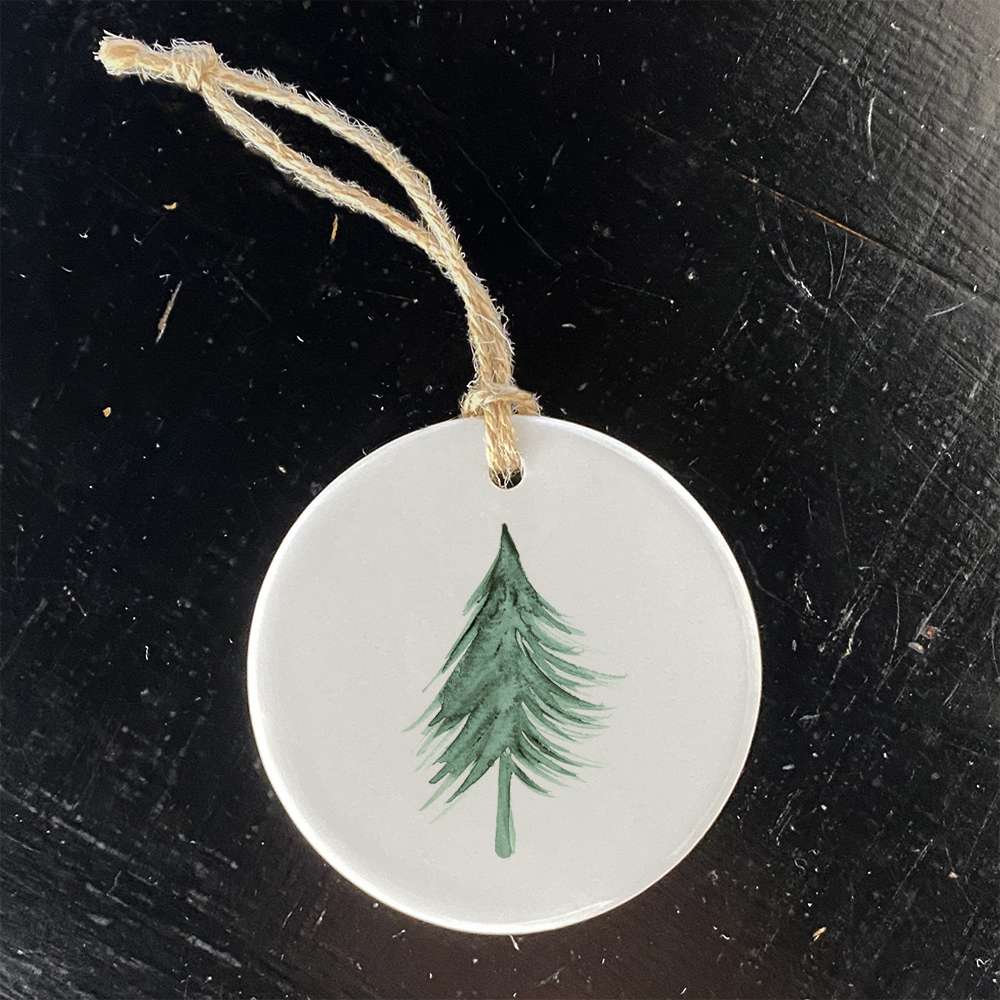 High-quality porcelain Evergreen Tree ornament with a glossy finish, featuring original designs printed in rural Wisconsin.