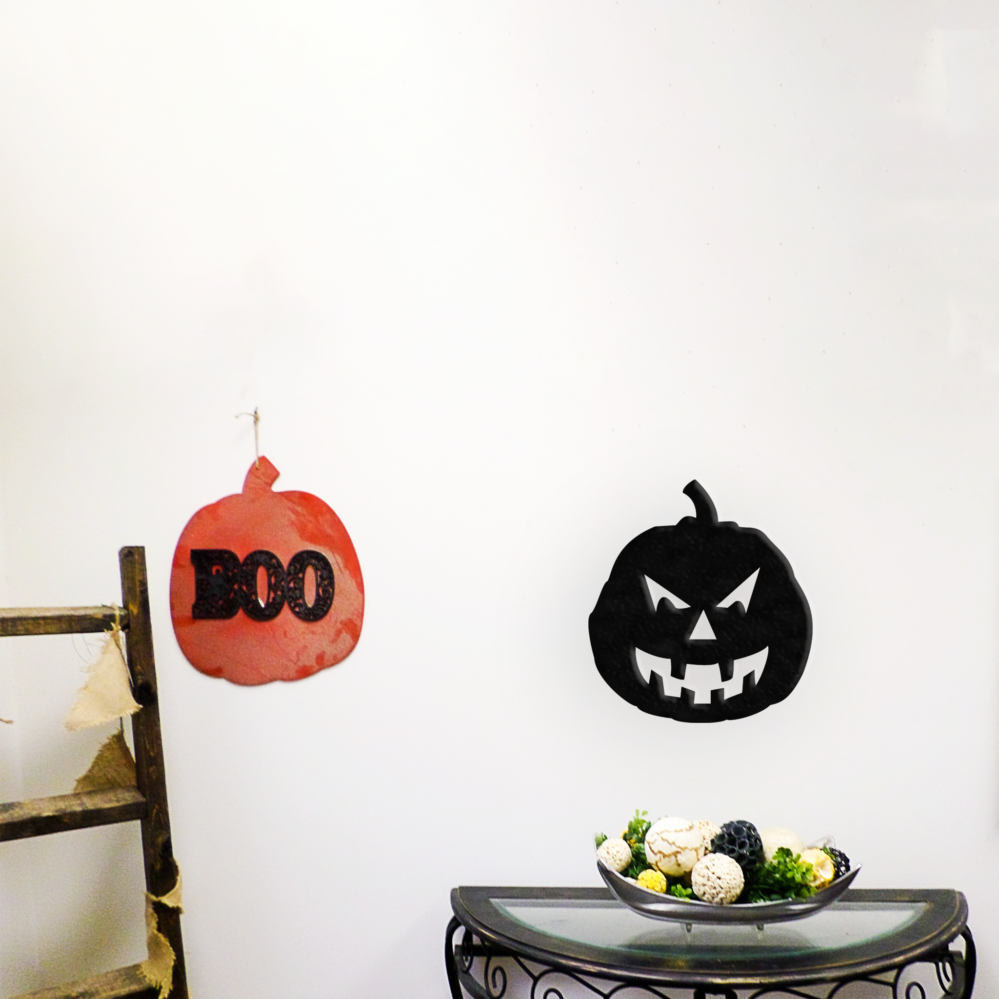 Evil Pumpkin metal wall art featuring a spooky design, crafted from high-quality steel with a low gloss finish, perfect for Halloween decor.