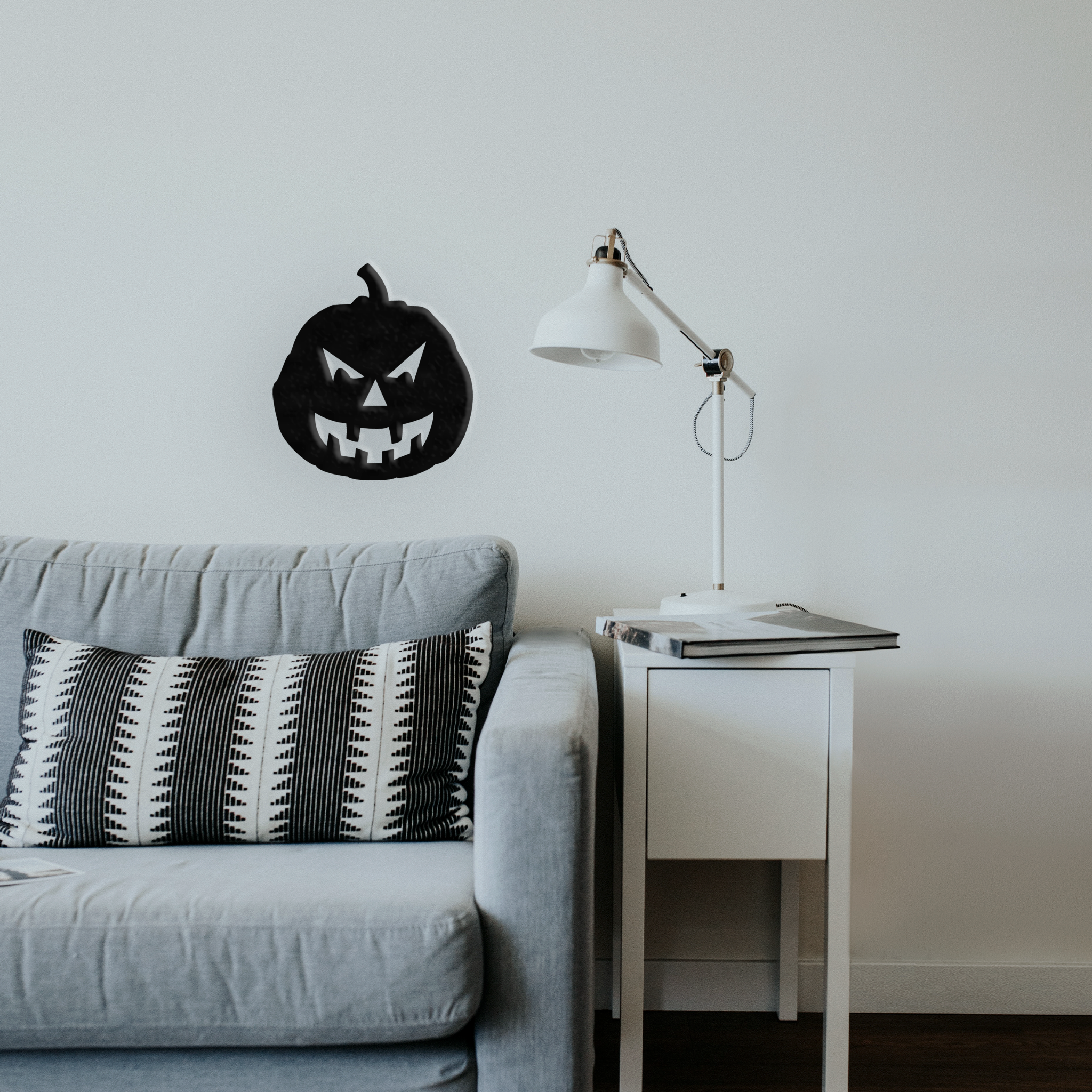 Evil Pumpkin metal wall art featuring a spooky design, crafted from high-quality steel with a low gloss finish, perfect for Halloween decor.