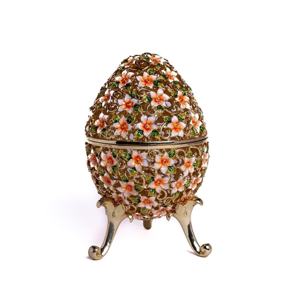 A beautifully crafted Faberge Egg trinket box decorated with vibrant flowers and Austrian crystals, showcasing 24K gold or 925 silver plating.