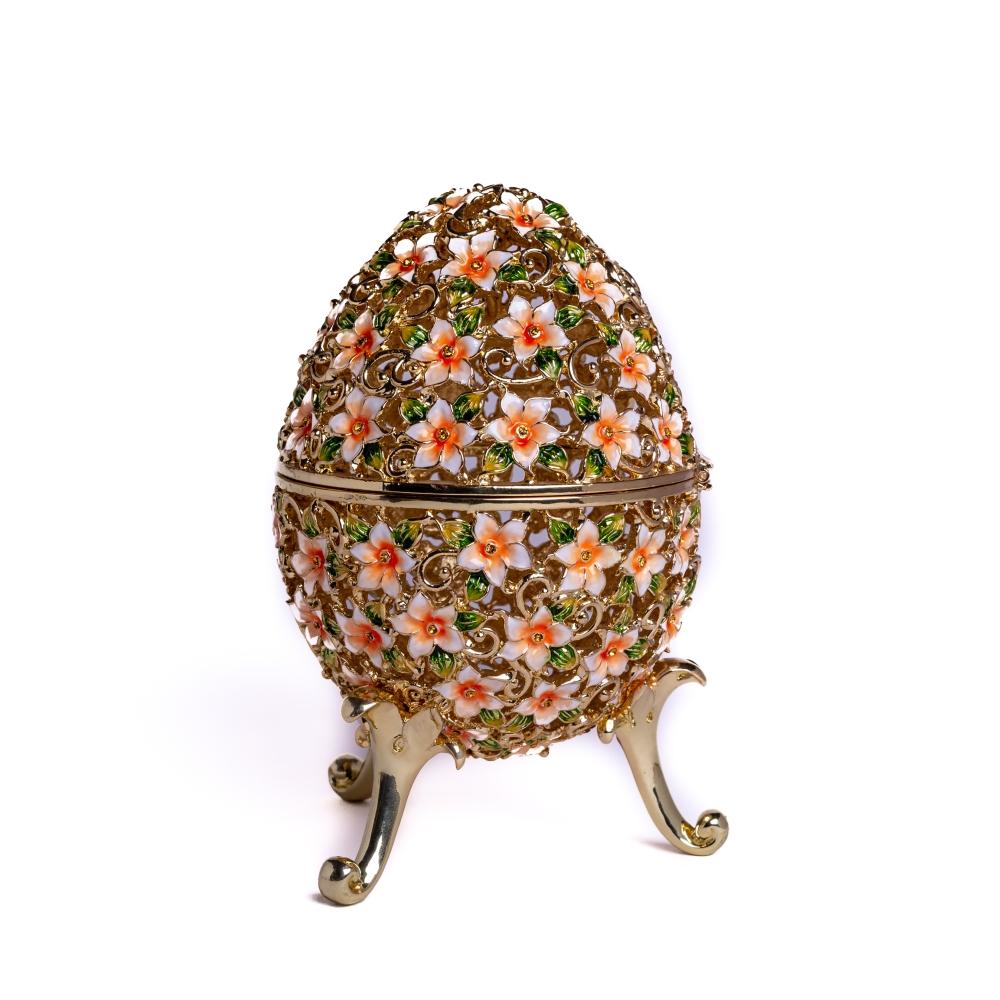 A beautifully crafted Faberge Egg trinket box decorated with vibrant flowers and Austrian crystals, showcasing 24K gold or 925 silver plating.