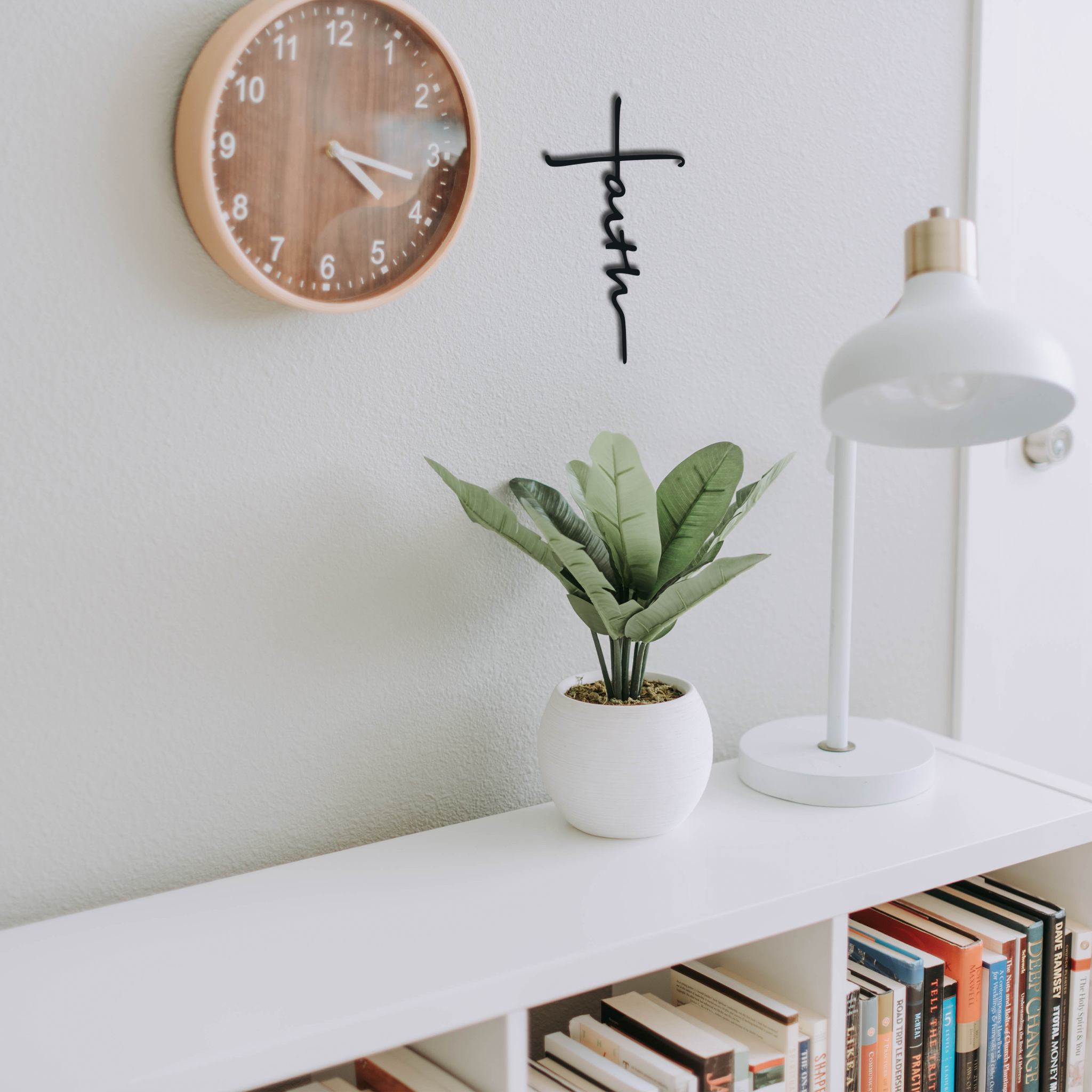 Faith Cross Metal Wall Art in low gloss black finish, symbolizing strength and spirituality.