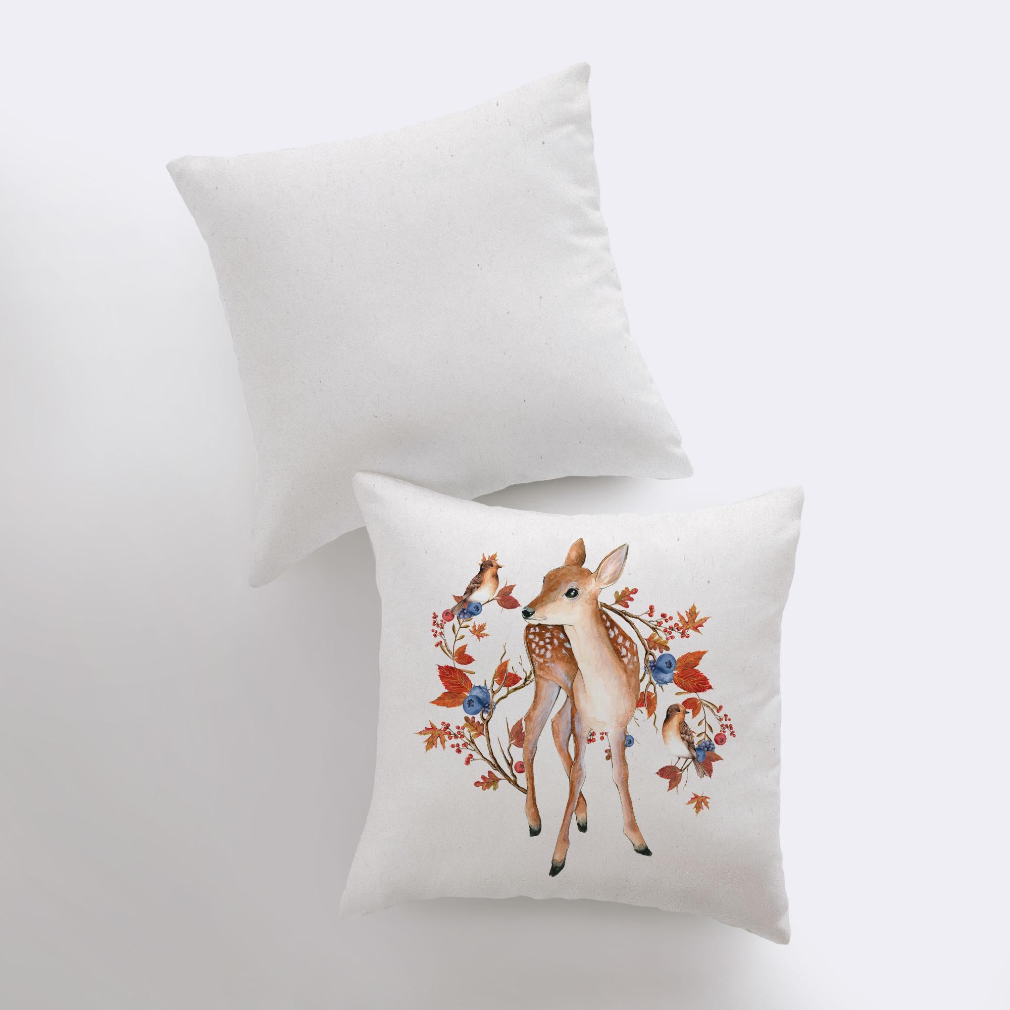 Fall Fawn Deer Looking Left Pillow Cover featuring a beige background with autumn leaves, blueberries, and a fawn, ideal for rustic decor.