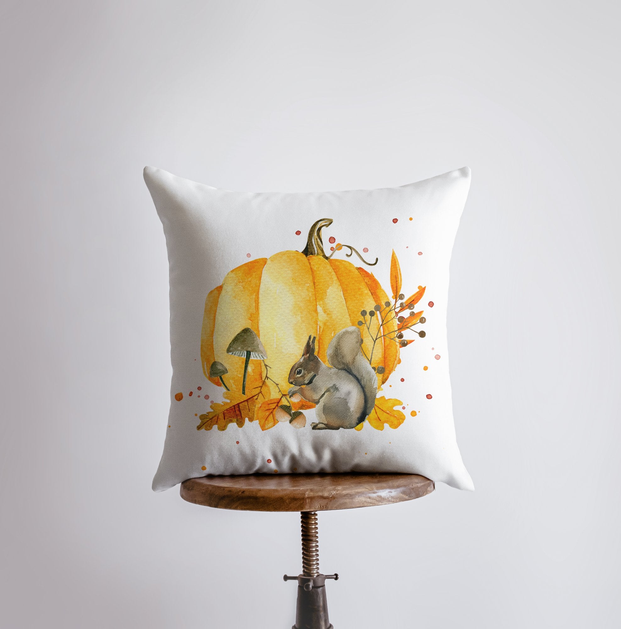 Handmade Fall Pumpkin Harvest Pillow Cover featuring a watercolor pumpkin and squirrel design, perfect for autumn decor.