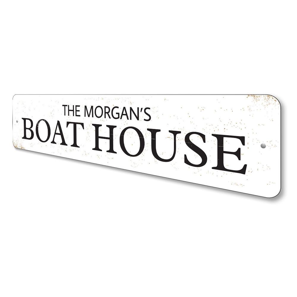 A personalized Family Boat House Sign made of high-quality aluminum, featuring customizable text and a rustic design, perfect for lakehouse decor.