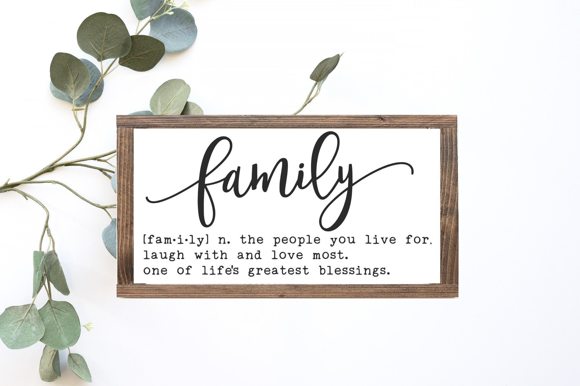 A beautifully crafted Family Definition Wood Sign in matte white, showcasing the word 'Family' with a rustic wooden background, perfect for home decor.