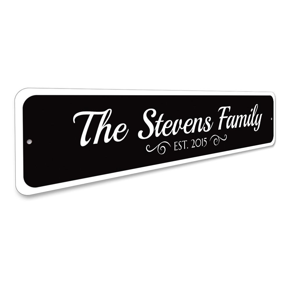 A personalized Family Est. Date Sign made of high-quality aluminum, featuring custom text and a decorative design, suitable for home decor.