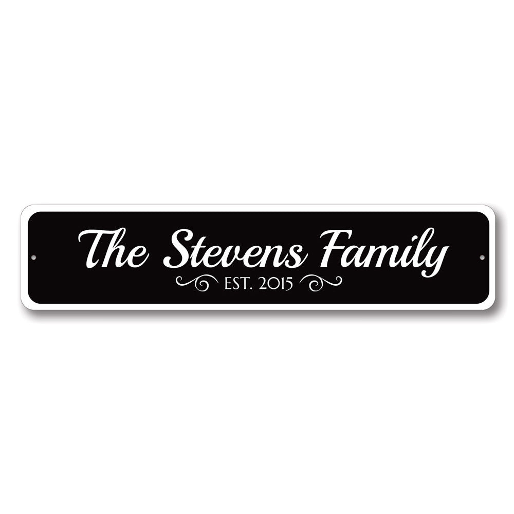 A personalized Family Est. Date Sign made of high-quality aluminum, featuring custom text and a decorative design, suitable for home decor.