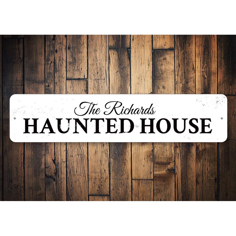 A spooky Family Haunted House Sign made of durable aluminum, featuring eerie graphics perfect for Halloween decor.