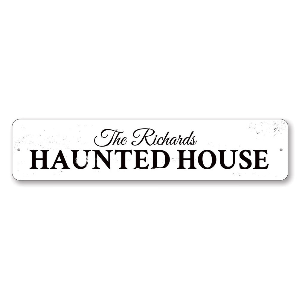 A spooky Family Haunted House Sign made of durable aluminum, featuring eerie graphics perfect for Halloween decor.